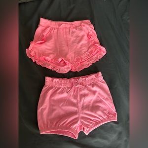 Two pair of pink jumping beans shorts